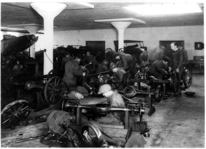 Men assembling automobile parts at an auto school in Washington, D.C. LCCN95500820
