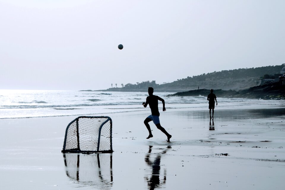 Coast play soccer silhouette