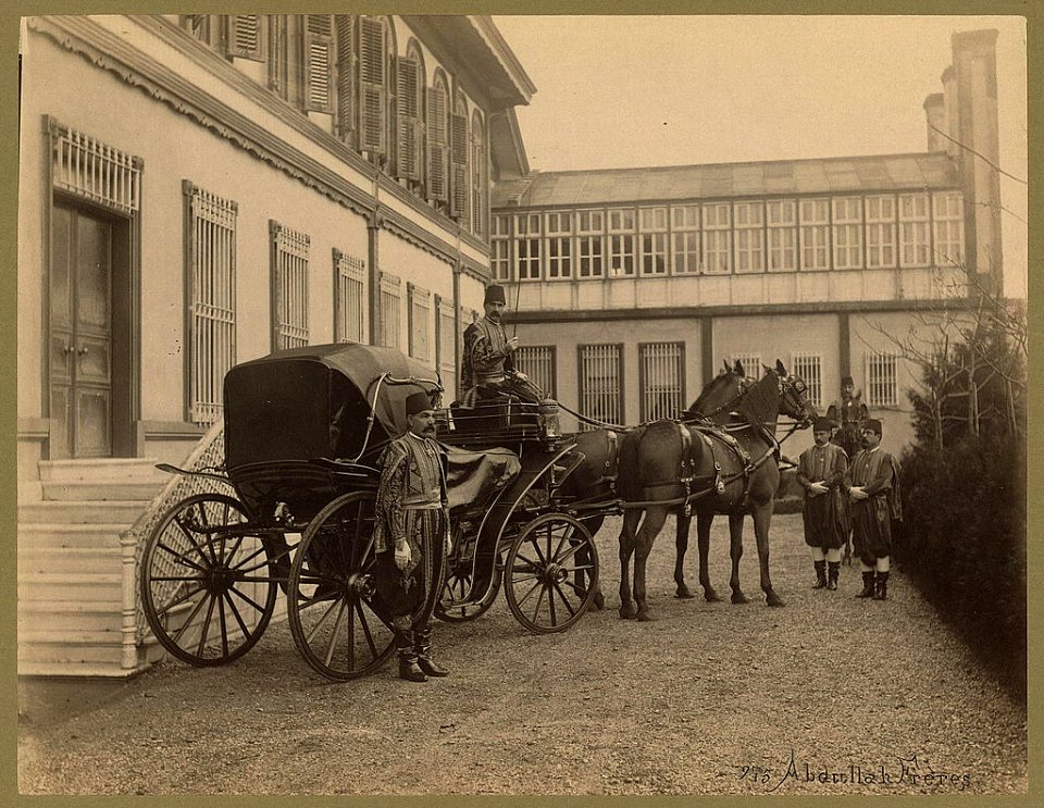 Men in uniform with horse drawn carriage in front of Yıldız Palace, Istanbul) - Abdullah Frères LCCN2003677099