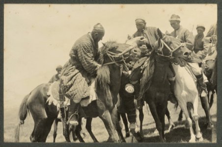 Men playing Buzkashi photo