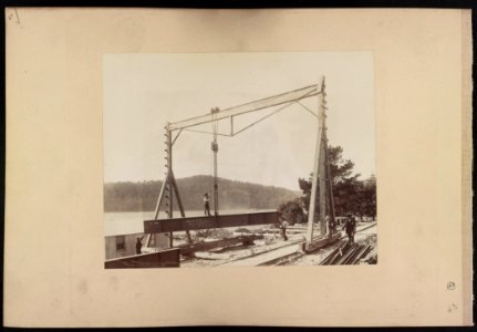 Men working with pulley system to move iron beams used for Hawkesbury River Railway Bridge project, New South Wales, Australia LCCN2016651678