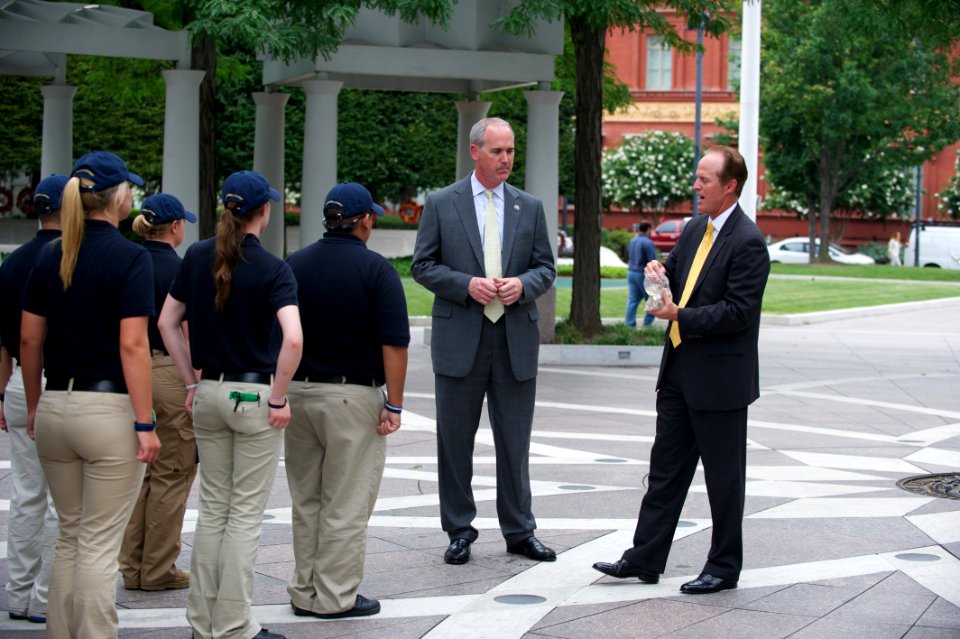 Men speak to law enforcement explorers