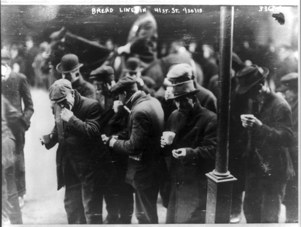 Men with coffee and bread from bread lines, 41st Street, New York City LCCN2016651306