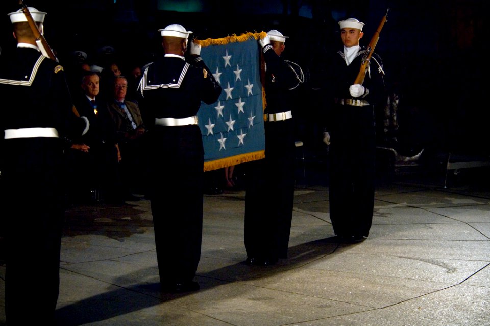 Members of the Navy Ceremonial Guard fold the Medal of Honor Flag to be presented to Daniel and Maureen Murphy (071023-N-5319A-021 )