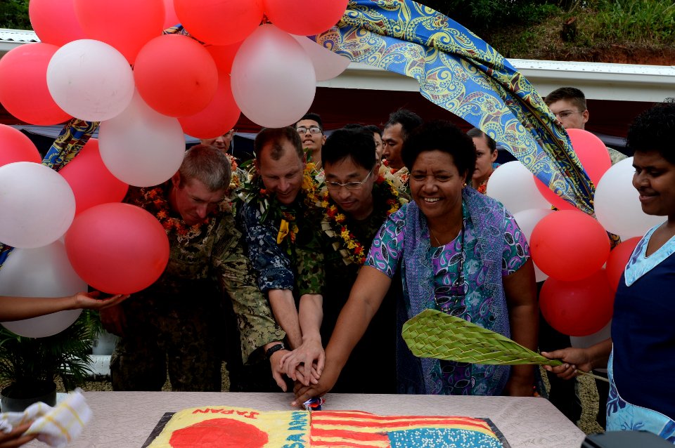 Mercy crew members participate in closing ceremony for the Viani Primary School during Pacific Partnership 2015 150617-N-PZ713-323