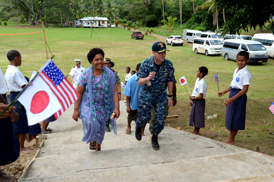 Mercy crew members participate in closing ceremony for the Viani Primary School during Pacific Partnership 2015 150617-N-PZ713-907
