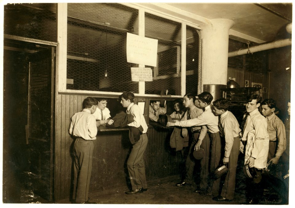 Messengers at the main office, Postal Telegraph Co., 283 B'way, turning in their uniforms at close of the day. The boys are carefully supervised and clothes are well kept. LOC nclc.03702
