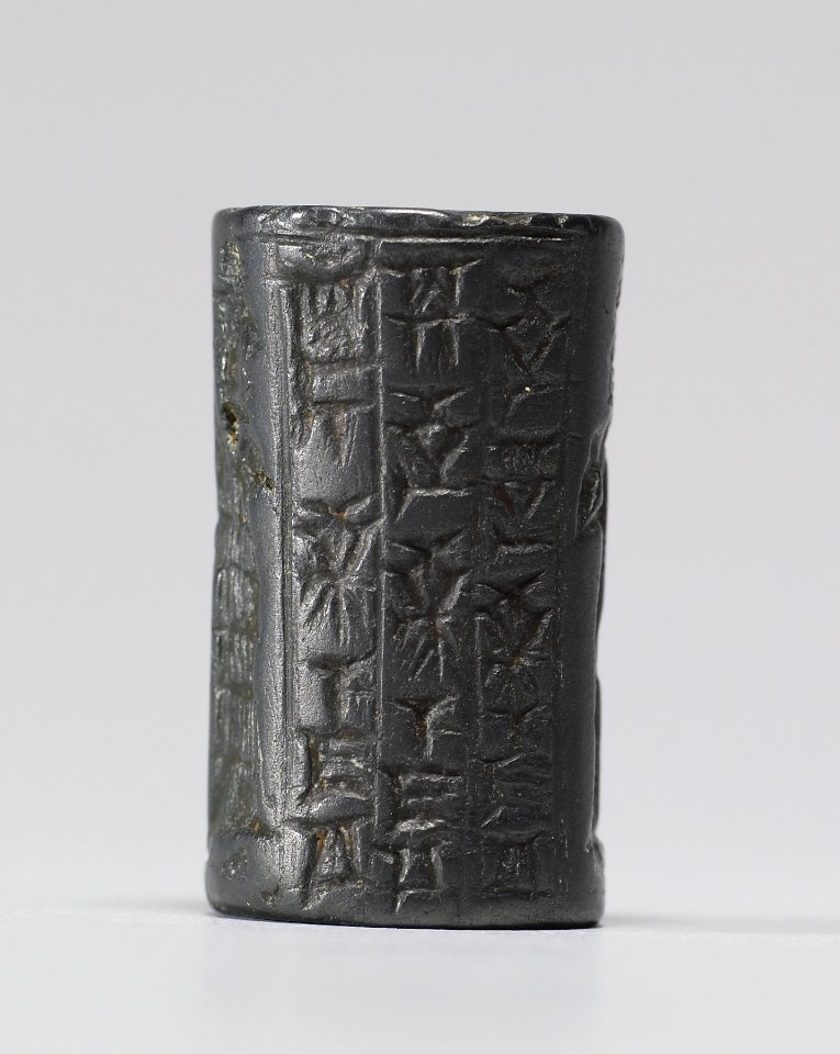 Mesopotamian - Cylinder Seal with Deity, Worshipper and Inscription - Walters 42437 - Side A