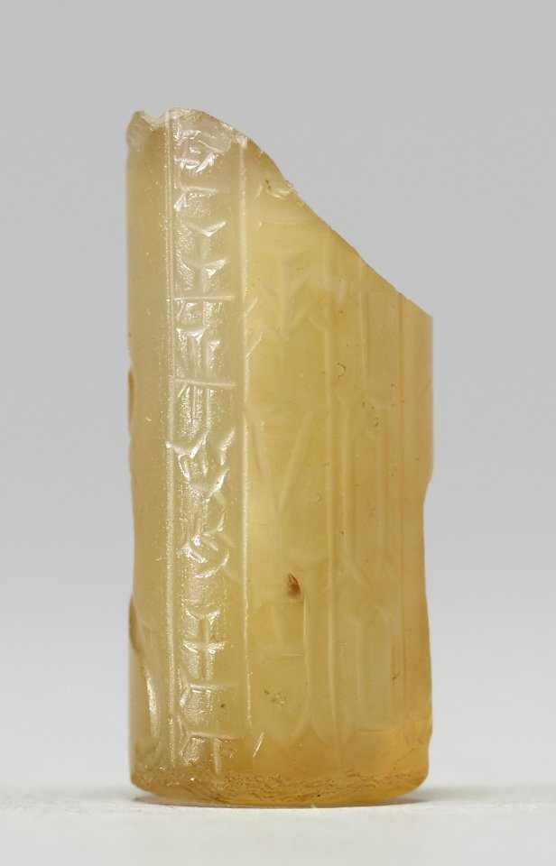 Mesopotamian - Cylinder Seal with Human Headed Winged Bull and Inscription - Walters 42808 - Side A
