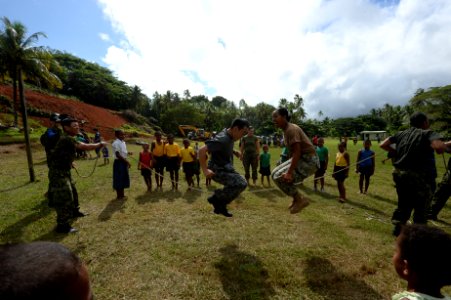 Mercy crew members participate in closing ceremony for the Viani Primary School during Pacific Partnership 2015 150617-N-PZ713-646