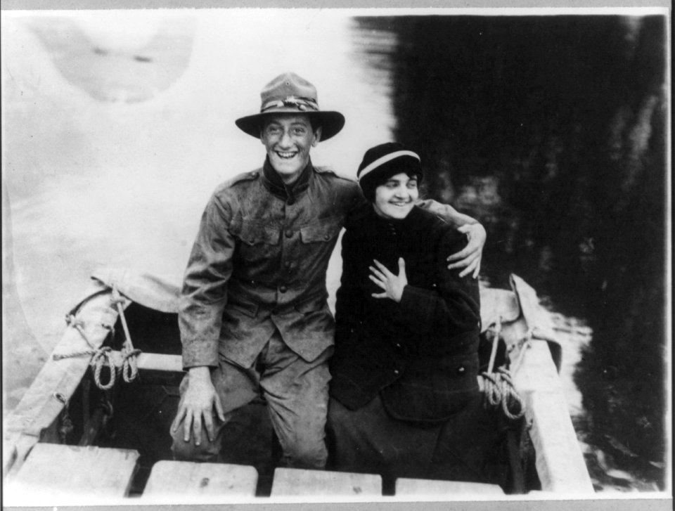 N.Y. National Guard training and maneuvers at Fishkill and Peekskill, N.Y.- Soldier with arm around girl in bow of boat LCCN2005691556