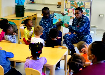 NAF Misawa Sailors read to children 151022-N-OK605-018