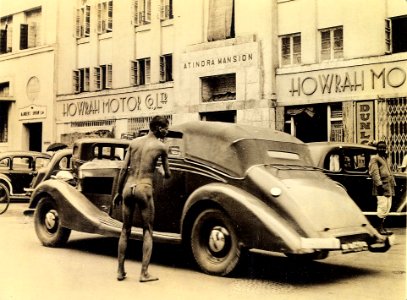 Naked man in the street in Calcutta in 1945