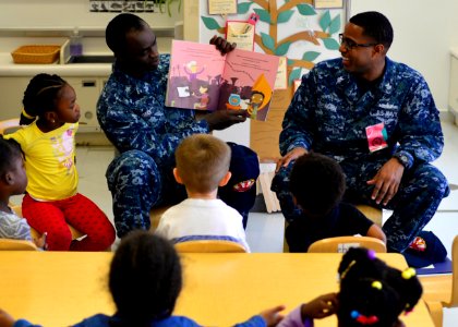 NAF Misawa Sailors read to children 151022-N-OK605-012