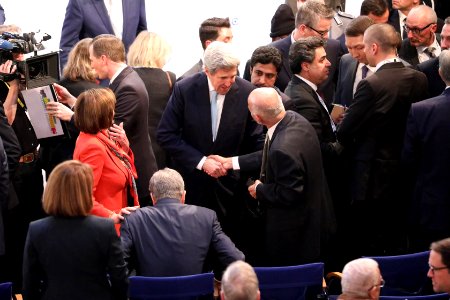 Nancy Pelosi and Senator John Kerry in the conference hall (49556965206) photo