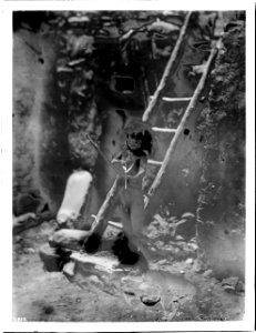 Naked Hopi Indian boy with bow and arrow, 1903 (CHS-3813)
