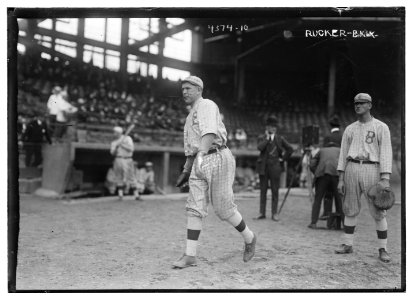 Nap Rucker, throwing, and Chief Meyers, catcher standing still, Brooklyn NL (baseball) LCCN2014705713