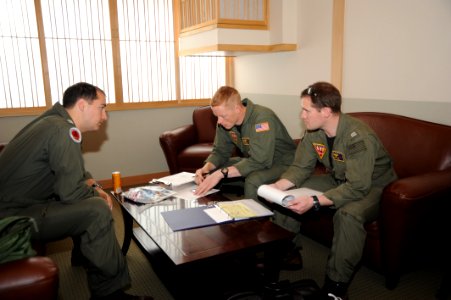 NAF Misawa crew members conduct pre-flight inspection on UC-12F Huron 120720-N-ZI955-034