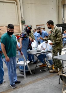 NAS Sigonella receives Afghan evacuees 210820-N-OX321-1030