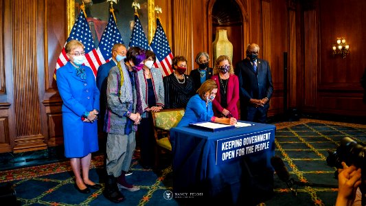 Nancy Pelosi signing HR 5305