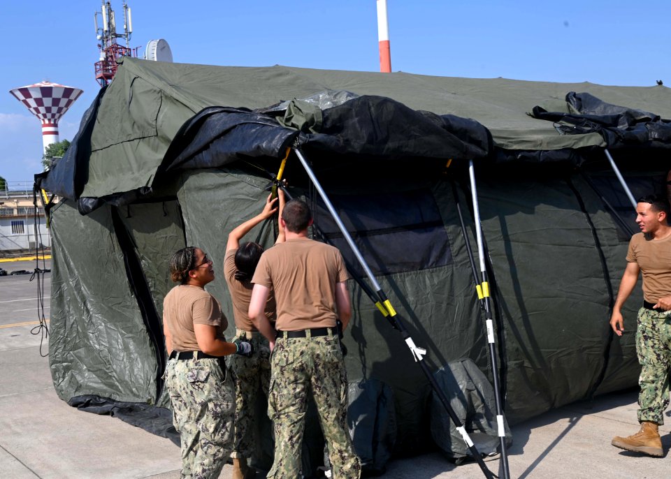 NAS Sigonella receives Afghan evacuees 210819-N-UJ449-1034