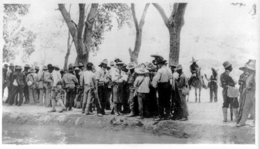 Mexican Insurrectos before the Battle of Juarez- Col. Garibaldi with troops receiving orders to advance on Juarez LCCN2007677270