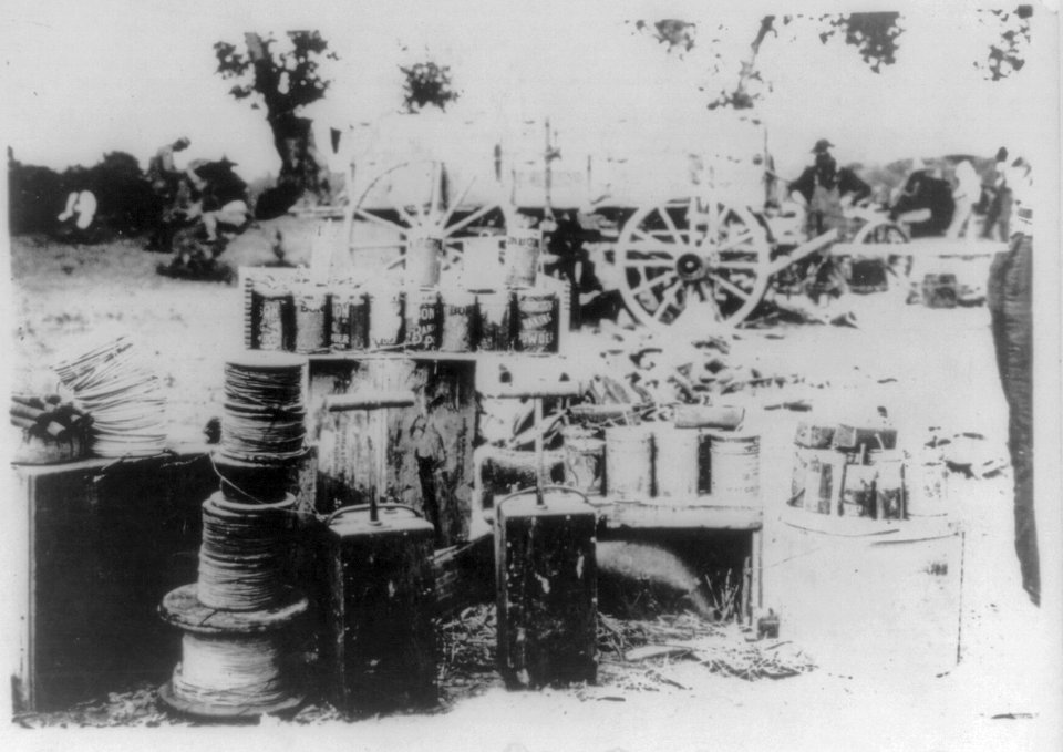 Mexican Insurrectos before the Battle of Juarez- Ammunition dump- tin can bombs, dynamite sticks, reels of wire, and detonator boxes LCCN2007677274