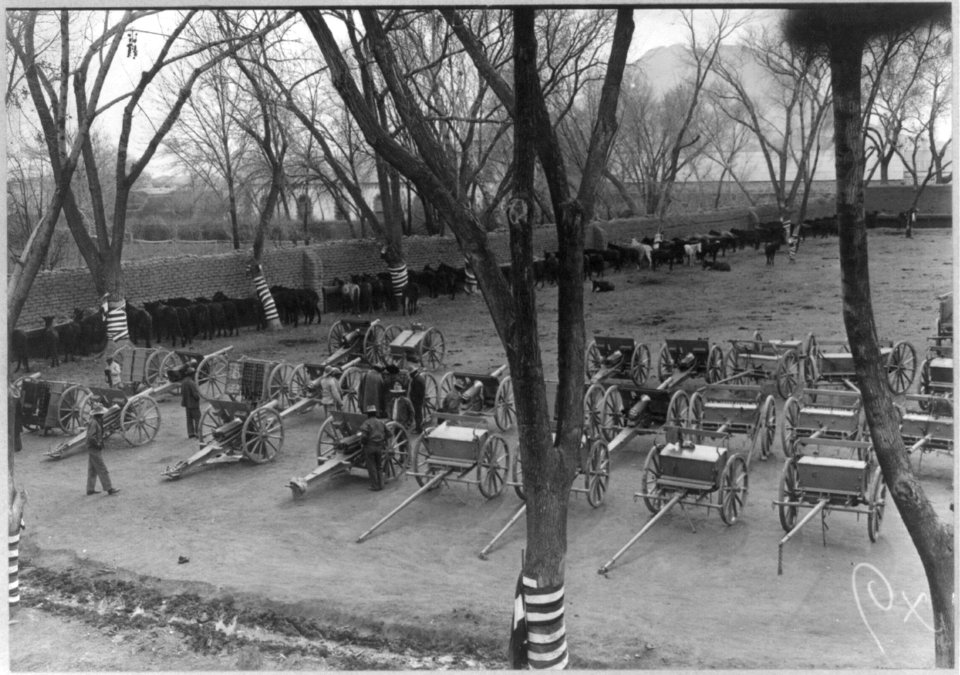 Mexican War, 1914- Field artillery and caisson wagons on parade ground LCCN2003655582