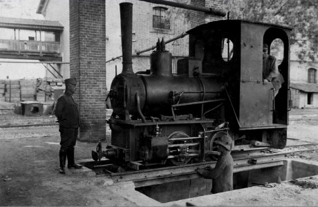 Narrow gauge steam locomotive during maintenance photo