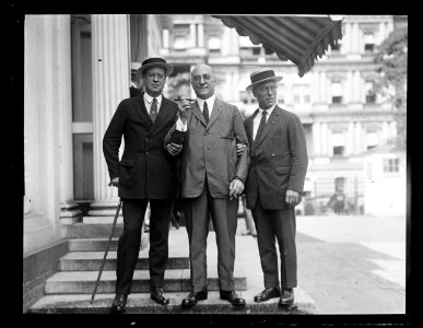 Nat'l Council of Travelling Salesmen Ass. Tim Healey. (Am...) Loeb, and Leon S. Fox at White House LCCN2016891623