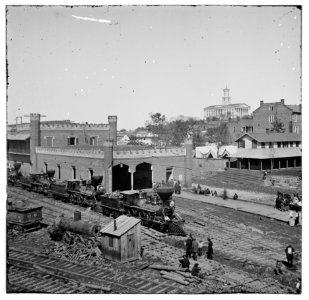 Nashville, Tenn. Railroad yard and depot with locomotives; the Capitol in distance LOC cwpb.02110