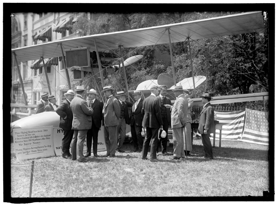 NATIONAL AERO COAST PATROL COMMN. CURTISS HYDROAEROPLANE OR FLYING BOAT EXHIBITED NEAR HOUSE OFFICE BUILDING. REP. KAHN; UNIDENTIFIED; ASST. SEC. INGRAHAM; ADM. PEARY; REP. LIEB; PROF. LCCN2016865156