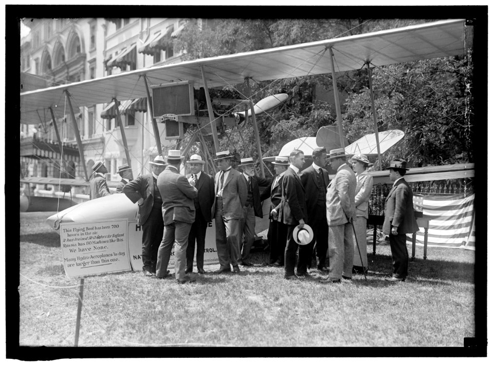 NATIONAL AERO COAST PATROL COMMN. CURTISS HYDROAEROPLANE OR FLYING BOAT EXHIBITED NEAR HOUSE OFFICE BUILDING. REP. KAHN; UNIDENTIFIED BACK; ASST. SEC. INGRAHAM; ADM. PEARY; REP. LIEB; PROF. LCCN2016865178