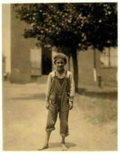 National Child Labor Committee. -3026 Johnnie Beam, one of the young workers in the Pelzer Mfg. Co., S.C. Been working here over a year. Appears to be under 12 years. LOC nclc.02622