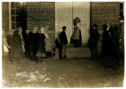 National Child Labor Committee. No. 435. Flashlight photo of children on night shift going to work at 6 P.M. on a cold, dark December night. They do not come out again until 6-00 A.M. When LOC nclc.01528