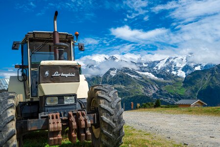 Tractor agriculture mountain photo