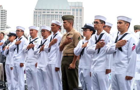 Naturalization ceremony held aboard USS Midway 150701-N-QC631-050