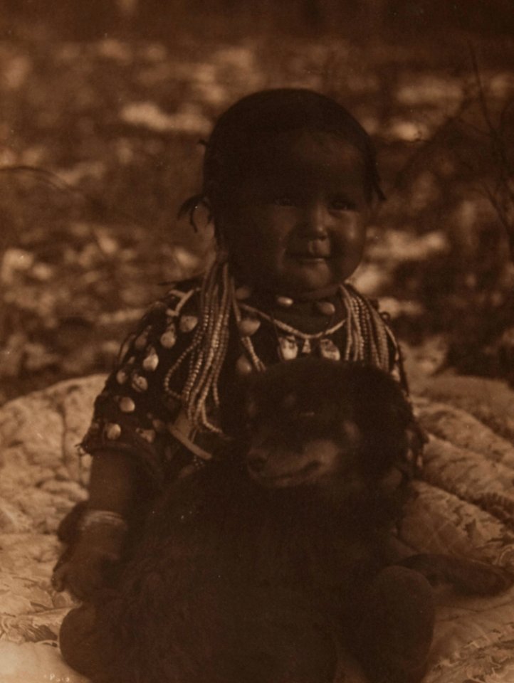 Native American child and dog