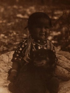 Native American child and dog photo