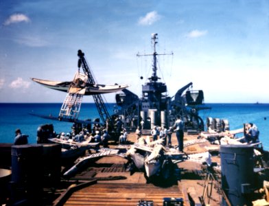 Native outriggers ar loaded aboard LST-1108 at Bikini Atoll, in March 1946 (146763094)