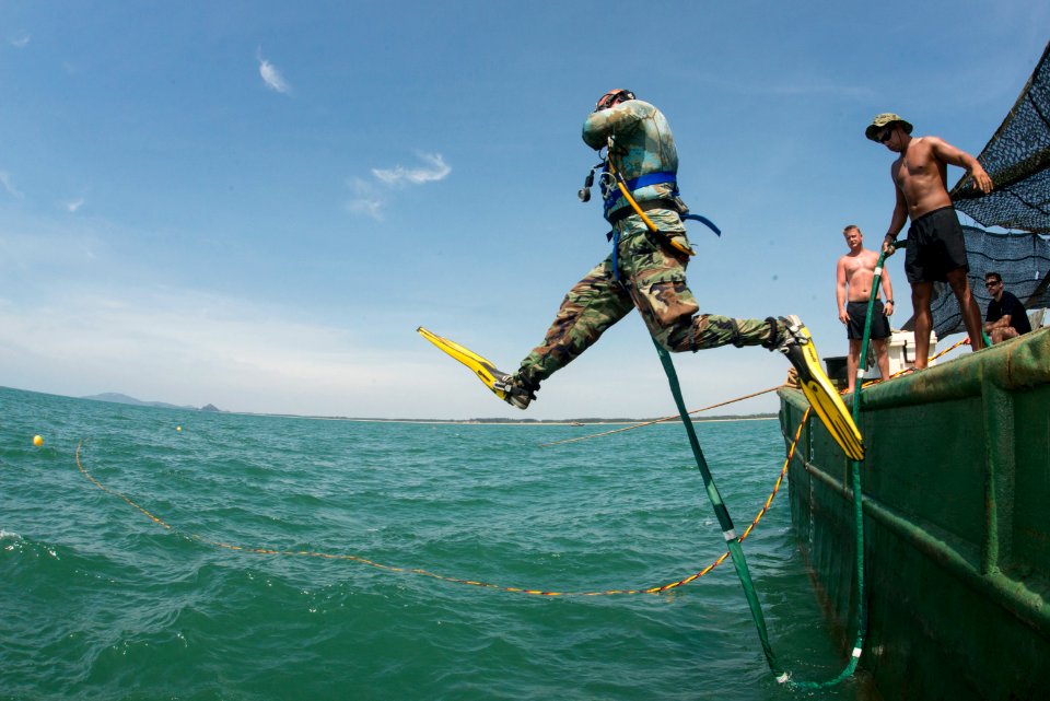 Navy diver enters water during POW-MIA recovery mission 150527-N-IP743-011