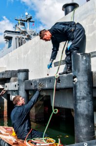 Navy divers fix Hotel Pier in Pearl Harbor. (8559262145)
