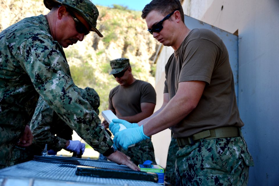 Navy Divers participate in Demolition Training 170215-N-FN215-037