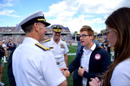 Navy officials attend Midshipmen football game 120929-N-WL435-411