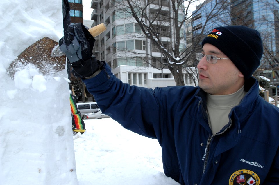 Navy Misawa snow sculpture team begins shaping 'The Lone Sailor' 120201-N-ZI955-182