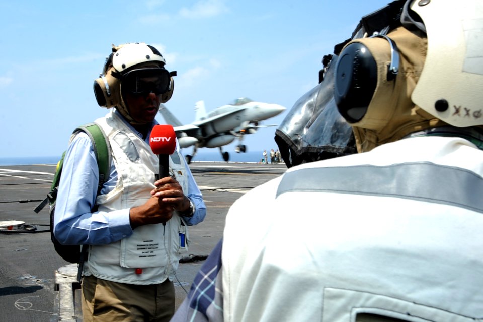 NDTV personnel embarked aboard the USS Theodore Roosevelt film flight operations during Exercise Malabar 2015