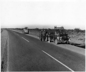 Near Coolidge on Highway 87, Pinal County, Arizona. Migratory white cotton pickers stopped by engine . . . - NARA - 522379