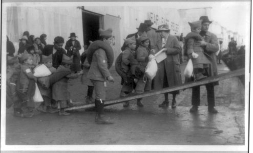Near East relief-Armenian orphans boarding barges at Constantinople, bound for Greece LCCN93515692