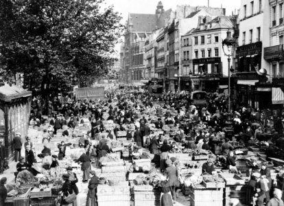 Nearly identical views of street market in Paris, France