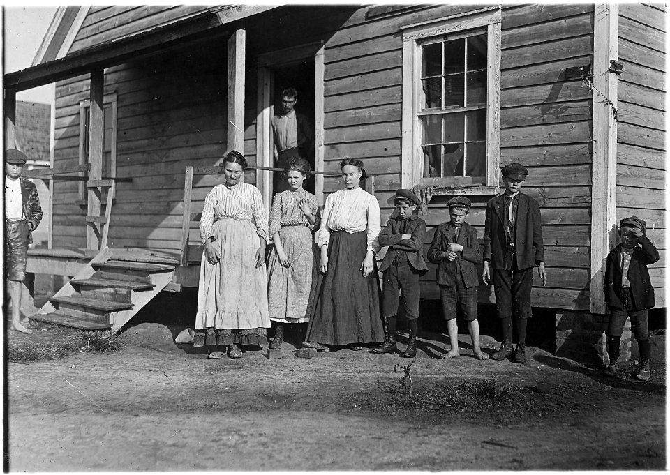 Nearly all of family works in mill. Father in doorway, Mrs. A.L. Conyers (at end) not in mill. Llewlyn, Bessie... - NARA - 523132